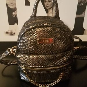 COPY - BCBG back pack style handbag.  Black and g…